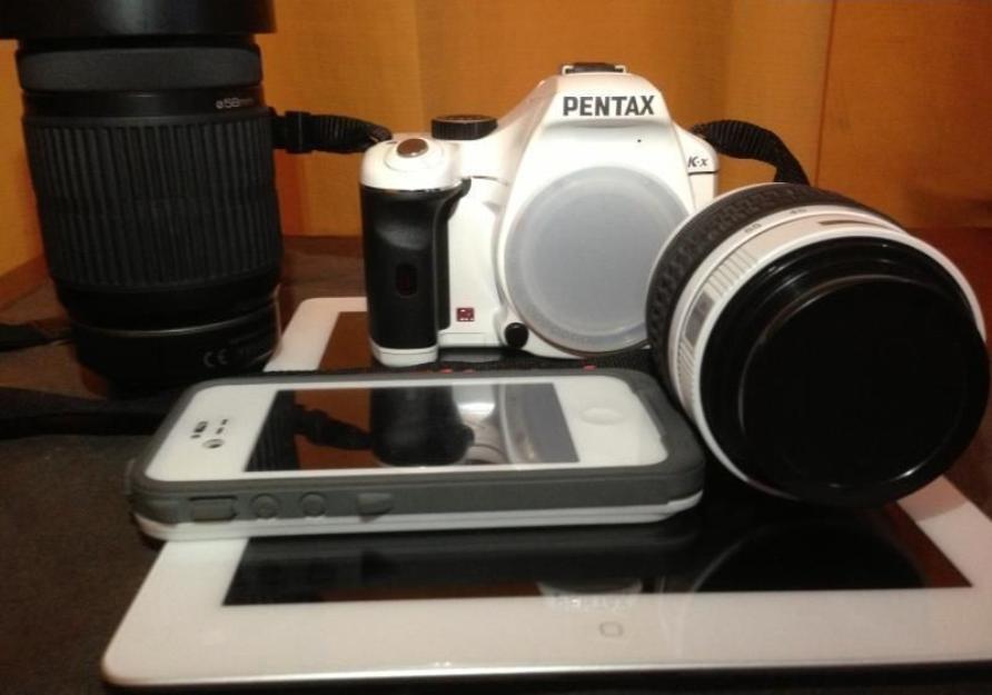 DSLR White Pentax KX w 18-55mm and 55-300mm Lens photo
